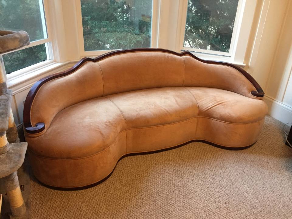 Custom built sofa taken apart, moved carefully through narrow spaces, and reassembled inside the customer's home by Couch Surgeon